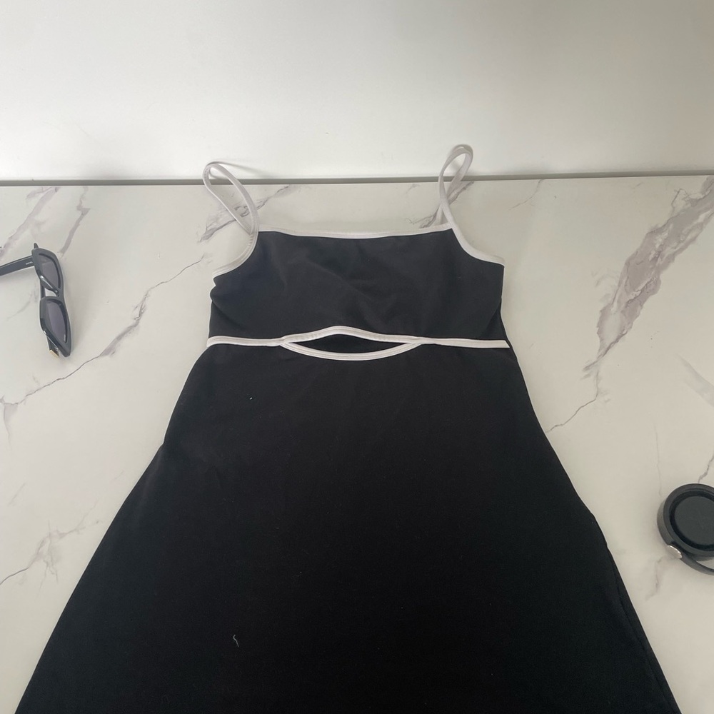 Elegant Black Dress with White Trim